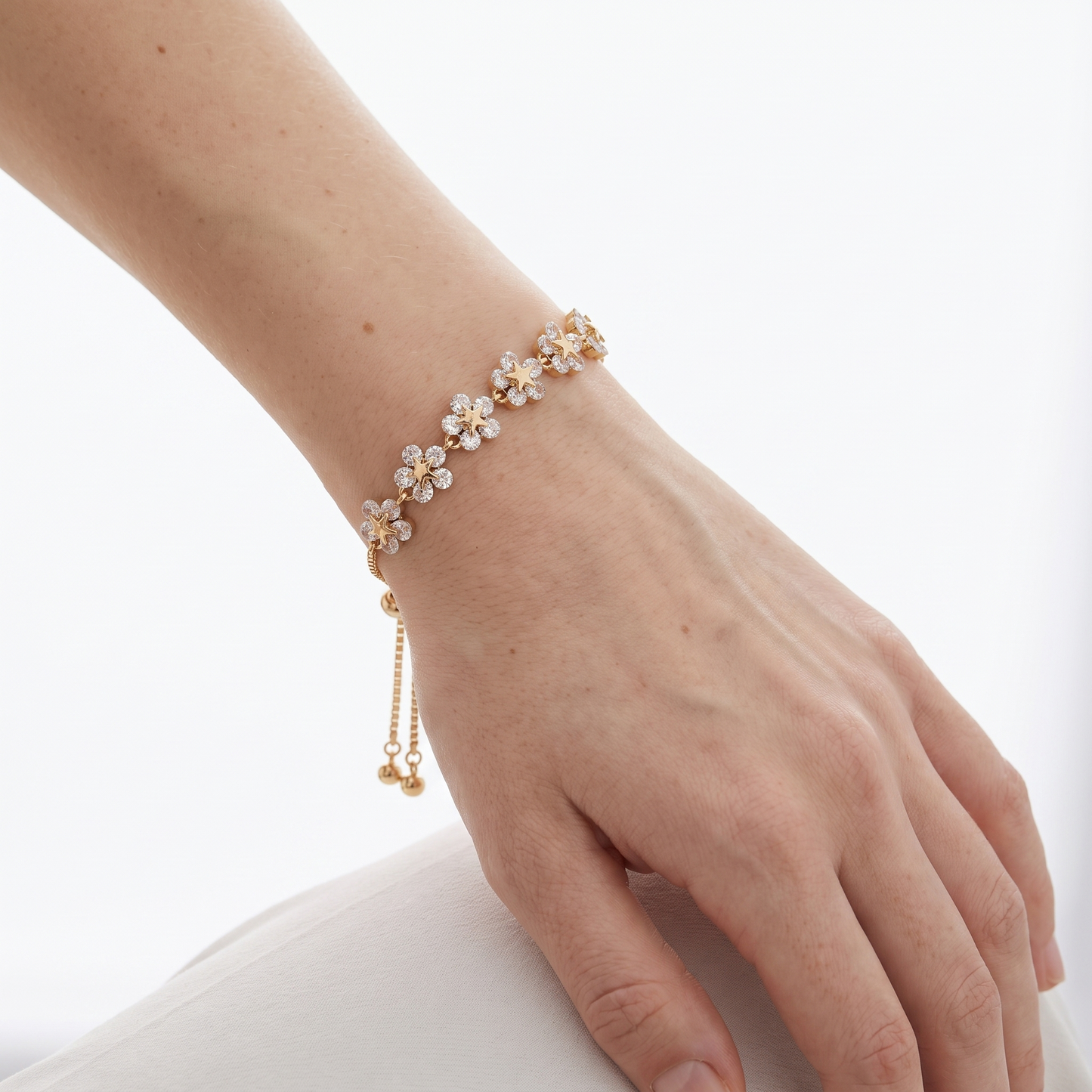 Sunoire europe america women fashion simple adjustable gold plated zirconia flower bracelet personalized design jewelry for party gifts 02 model wearing gold