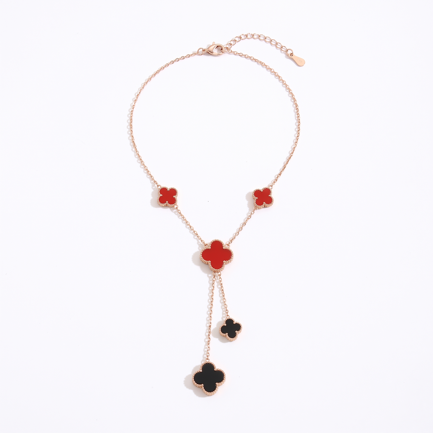 Sunoire premium 316l stainless steel four leaf clover jewelry set trendy women s gift 09 flatlay rose gold black and red clover