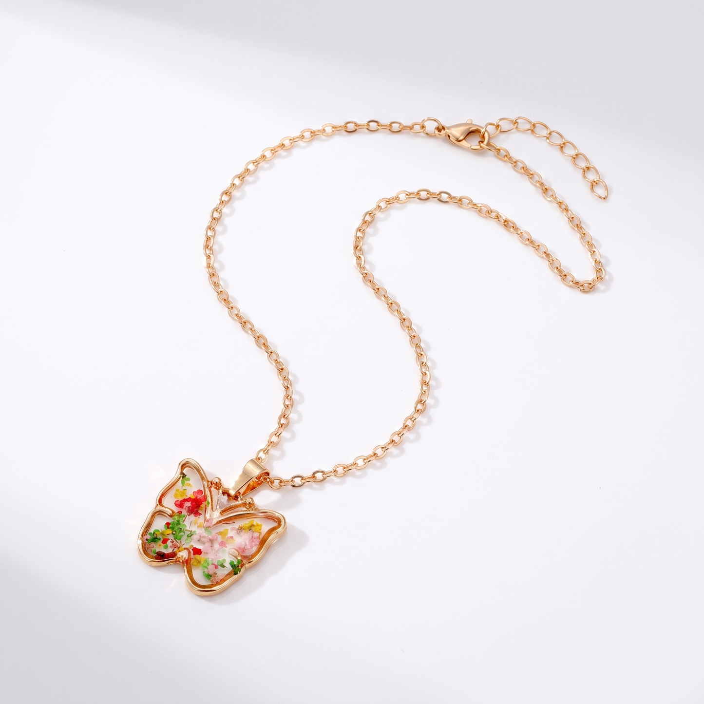Sunoire non tarnish 18k gold plated korean bohemian pastoral small fragmented fashion dried flower charms pendant necklace for women 13 flatlay butterfly confetti