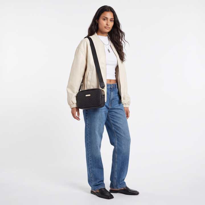 Sunoire harlow black quilted camera bag worn detail 01