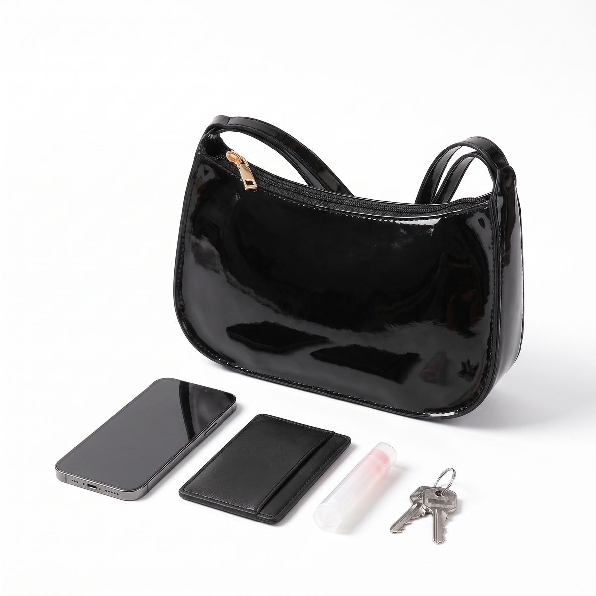 Patent Crescent Baguette Bag, what fits inside
