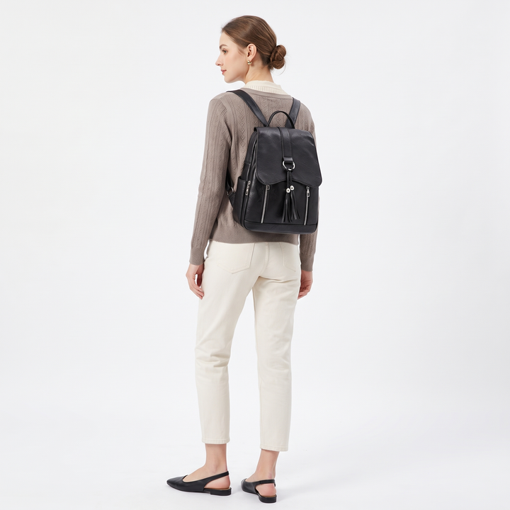 Women's Faux Leather Tassel Flap Backpack, worn from behind