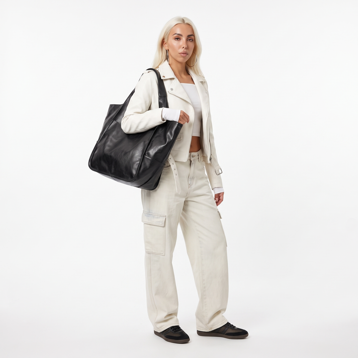 Women's Oversized Slouchy Faux Leather Tote Bag, worn by a model