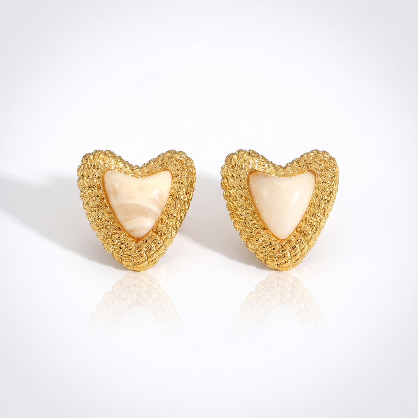Sunoire european and american women 18k high quality gold earrings creative irregular pendant leaf earring fashion personalized jewelry 01 flatlay cream