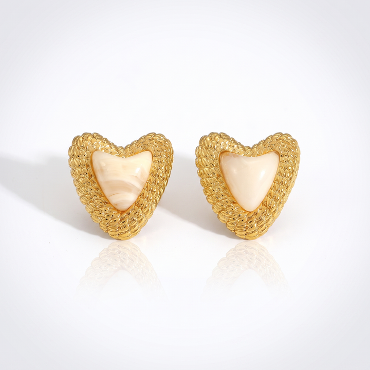 Sunoire european and american women 18k high quality gold earrings creative irregular pendant leaf earring fashion personalized jewelry 01 flatlay cream