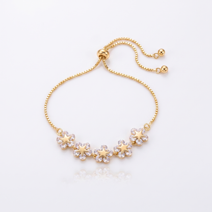 Sunoire europe america women fashion simple adjustable gold plated zirconia flower bracelet personalized design jewelry for party gifts 01 flatlay gold