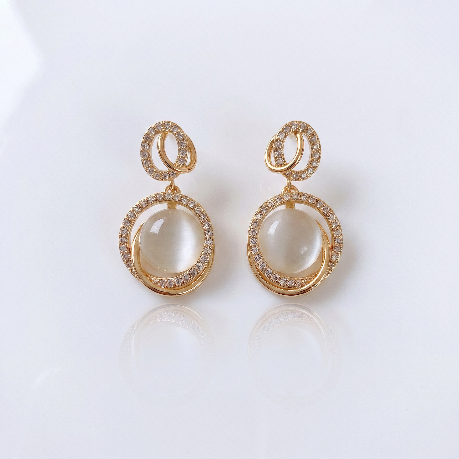 Sunoire new wholesale 925 silver needle alloy stereo geometry cat eye female stud temperament fashion earrings 01 flatlay gold