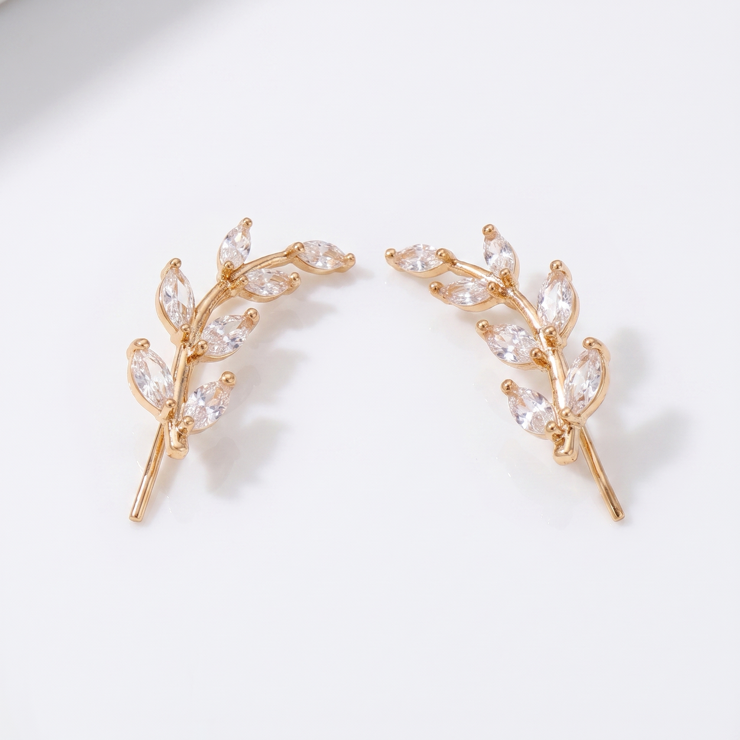 Sunoire fashionable women s earrings premium leaf style earrings with diamond accents suitable for sensitive ears as an accessory 01 flatlay gold