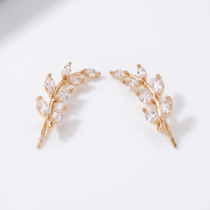 Sunoire fashionable women s earrings premium leaf style earrings with diamond accents suitable for sensitive ears as an accessory 01 flatlay gold