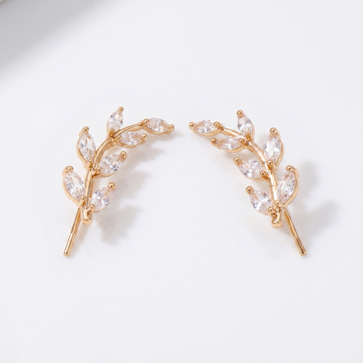 Sunoire fashionable women s earrings premium leaf style earrings with diamond accents suitable for sensitive ears as an accessory 01 flatlay gold