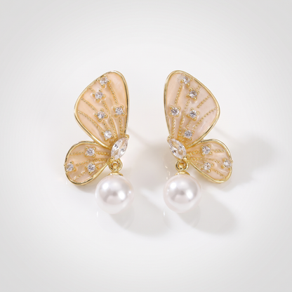 Sunoire elegant trendy gold plated pearl zircon symmetric butterfly earrings for women fashionable drop earrings with brass material 01 flatlay gold