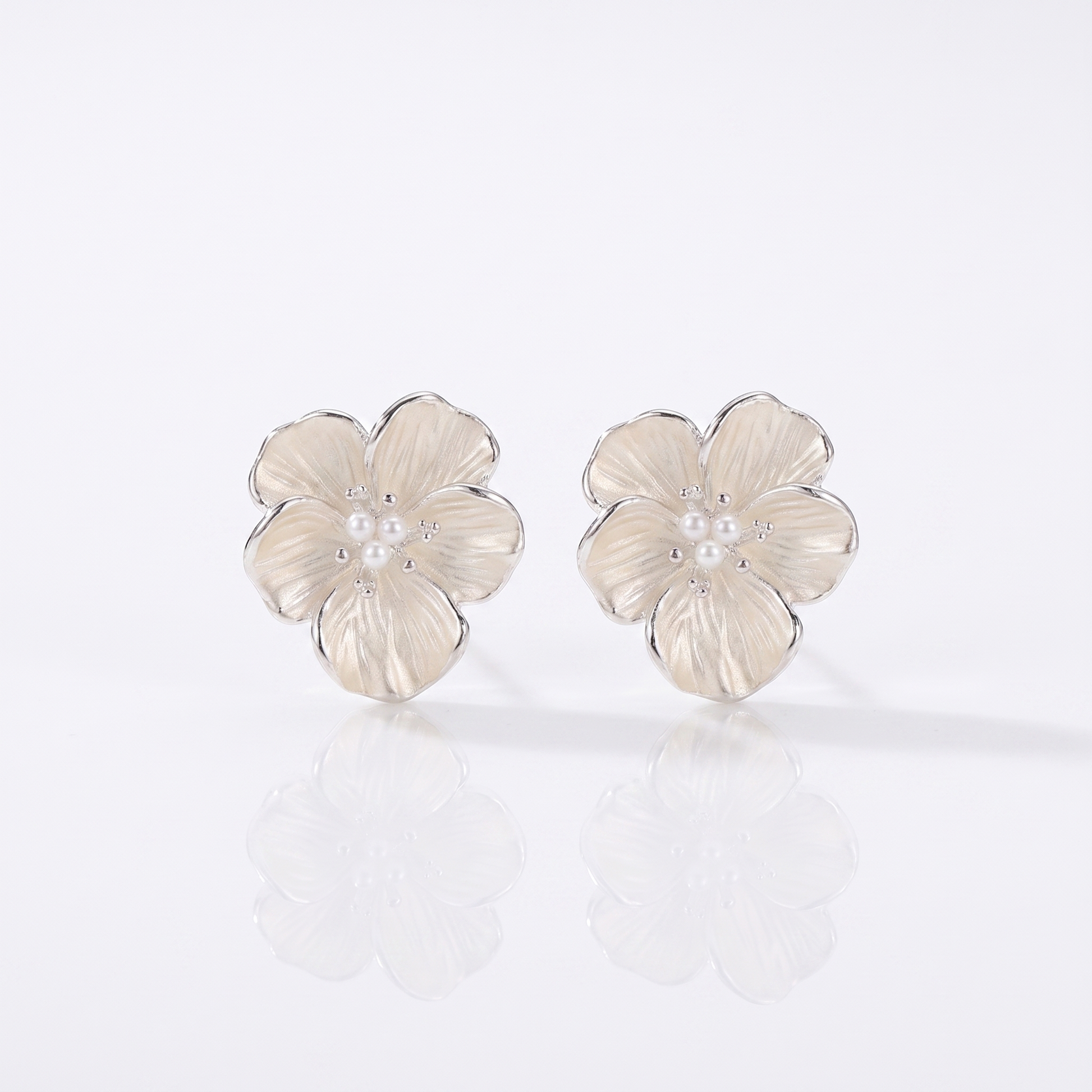 Sunoire minimalist floral earrings with 3d flower design for ladies trendy sweet cool style individual jewelry look item 01 flatlay white
