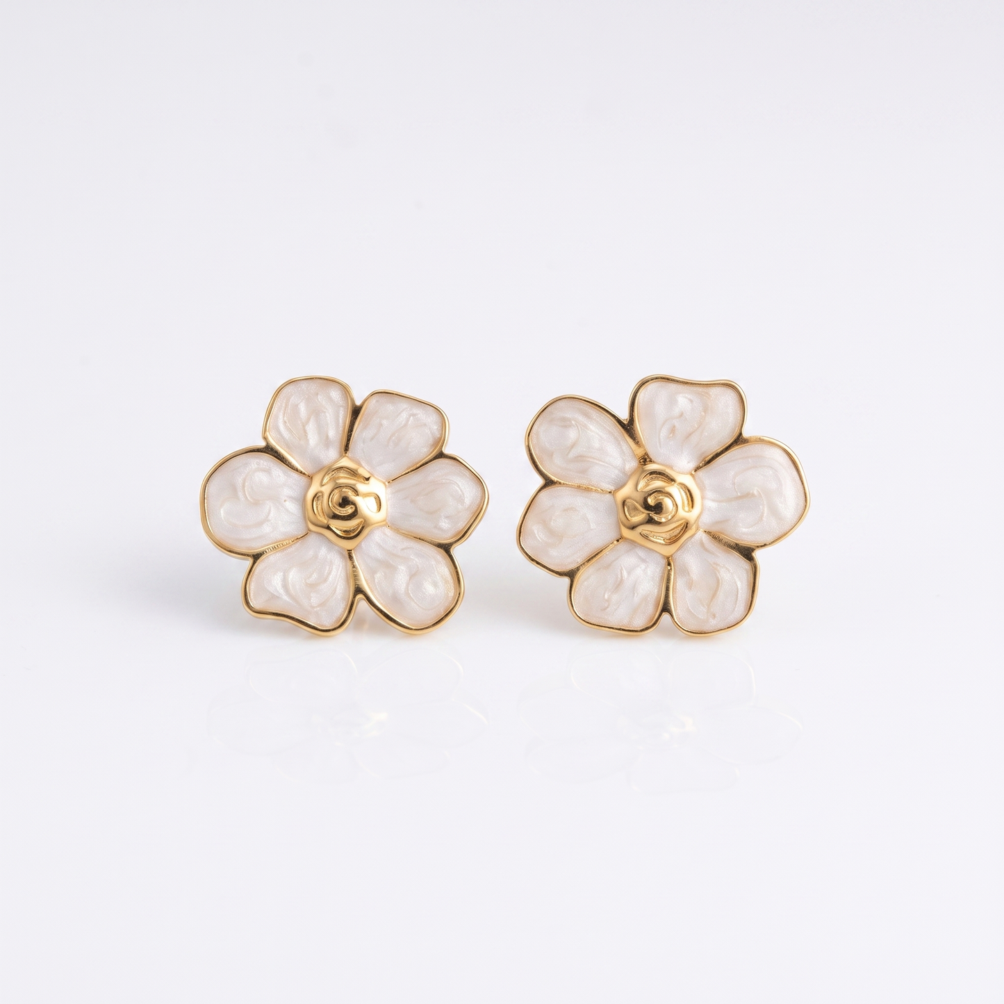 Sunoire women s trendy stainless steel stud earrings minimalist six petaled flower lucky gold color plating wholesale retro party 01 flatlay white