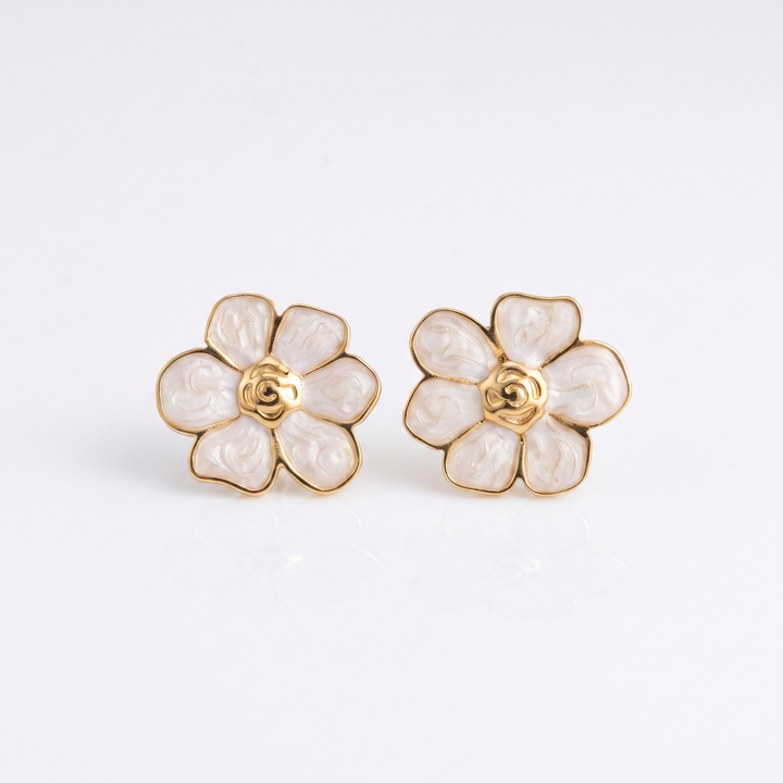 Sunoire women s trendy stainless steel stud earrings minimalist six petaled flower lucky gold color plating wholesale retro party 01 flatlay white