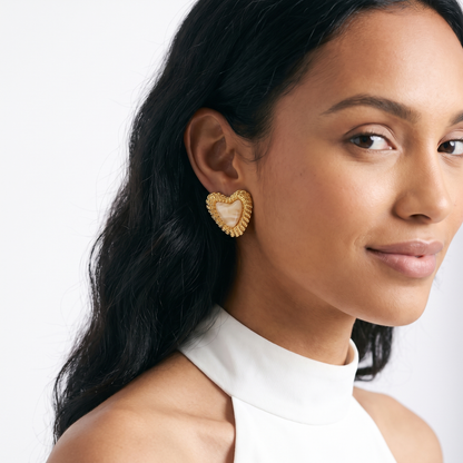 Sunoire european and american women 18k high quality gold earrings creative irregular pendant leaf earring fashion personalized jewelry 02 model wearing cream