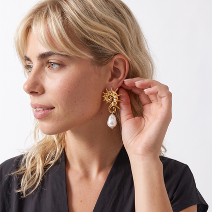 Sunoire yw fashion 18k gold stainless steel seahorse pendant earrings trendy irregular pearl jewelry for women 02 model wearing gold