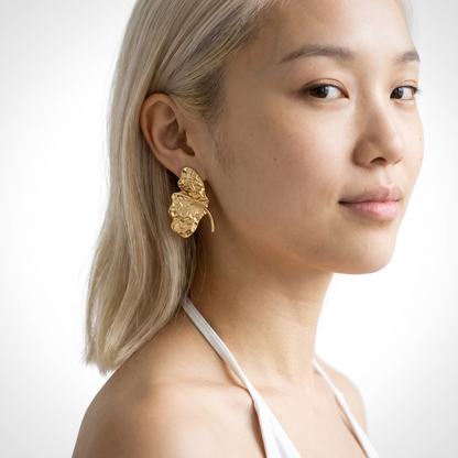 Sunoire summer beach holiday style 18k gold stainless steel hammered ginkgo leaf stud earring elegant stylish personality leaves earring 02 model wearing gold