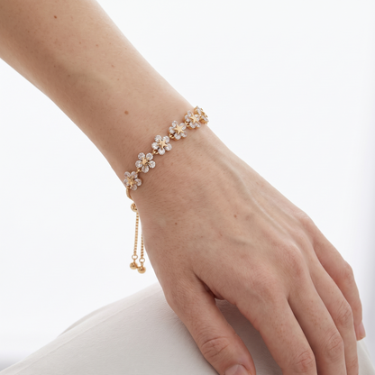 Sunoire europe america women fashion simple adjustable gold plated zirconia flower bracelet personalized design jewelry for party gifts 02 model wearing gold