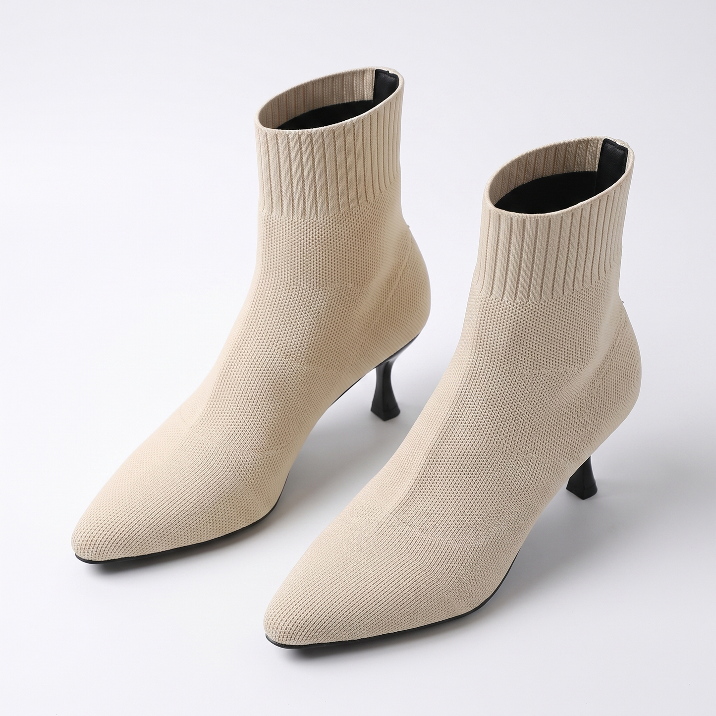 Sunoire knit stiletto ankle boots 05 pair flatlay beige