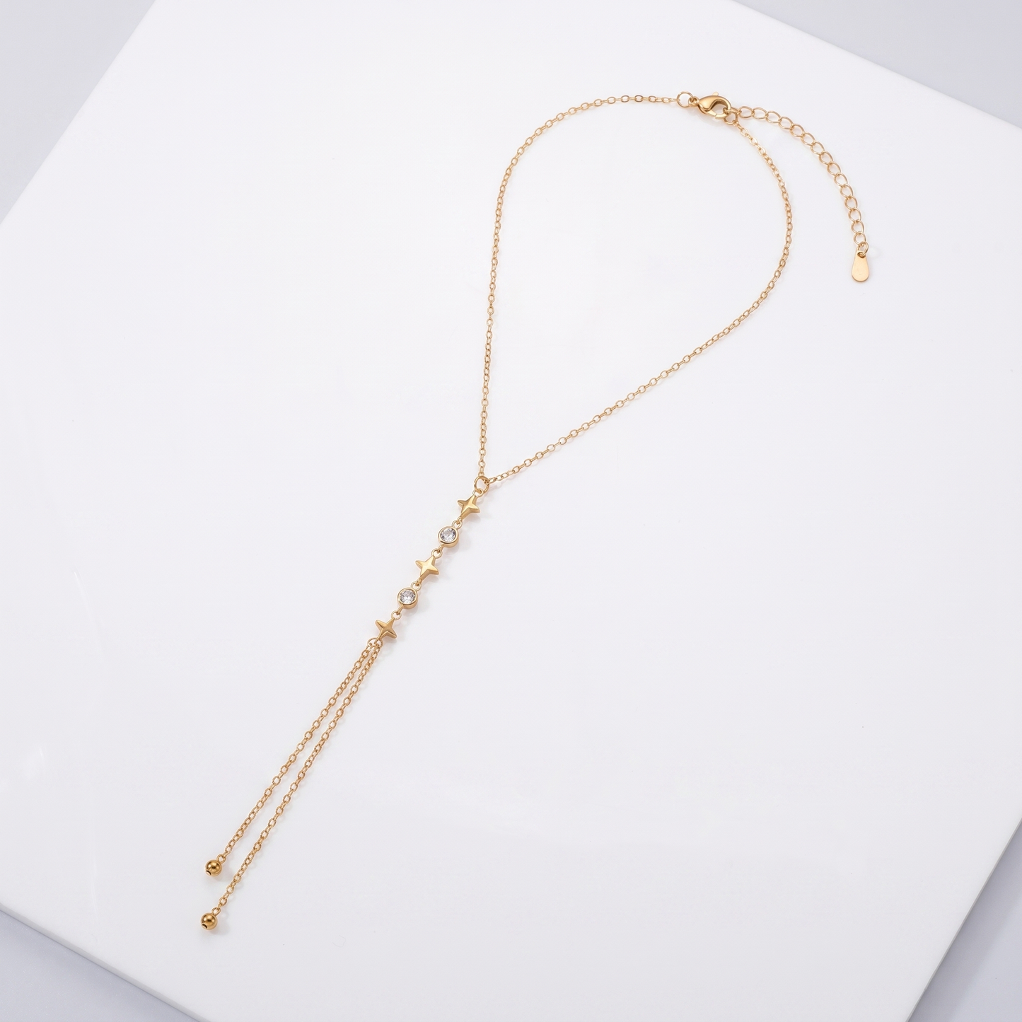 Sunoire fashion zircon stainless steel gold plated women s luxury heart moon pendant sweater necklace 06 flatlay star tassel