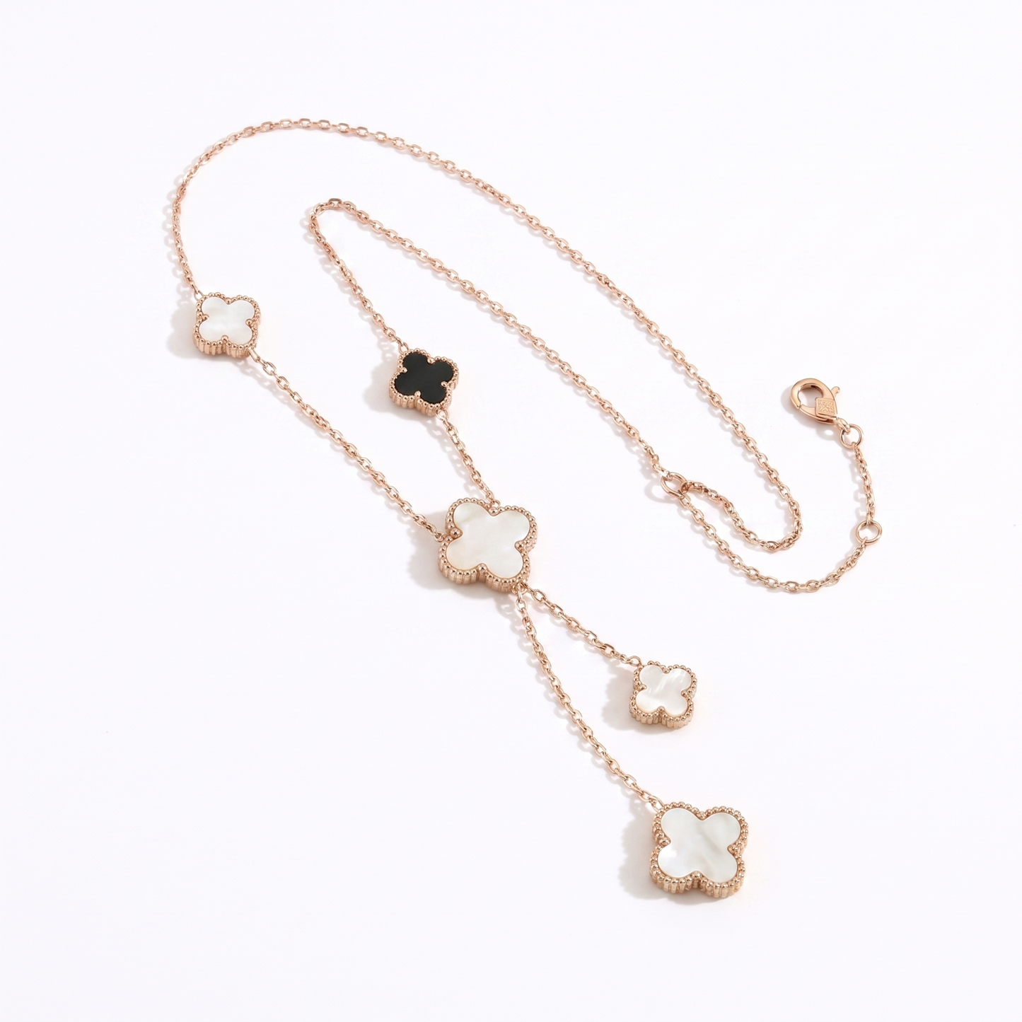 Sunoire premium 316l stainless steel four leaf clover jewelry set trendy women s gift 08 flatlay rose gold black and white clover