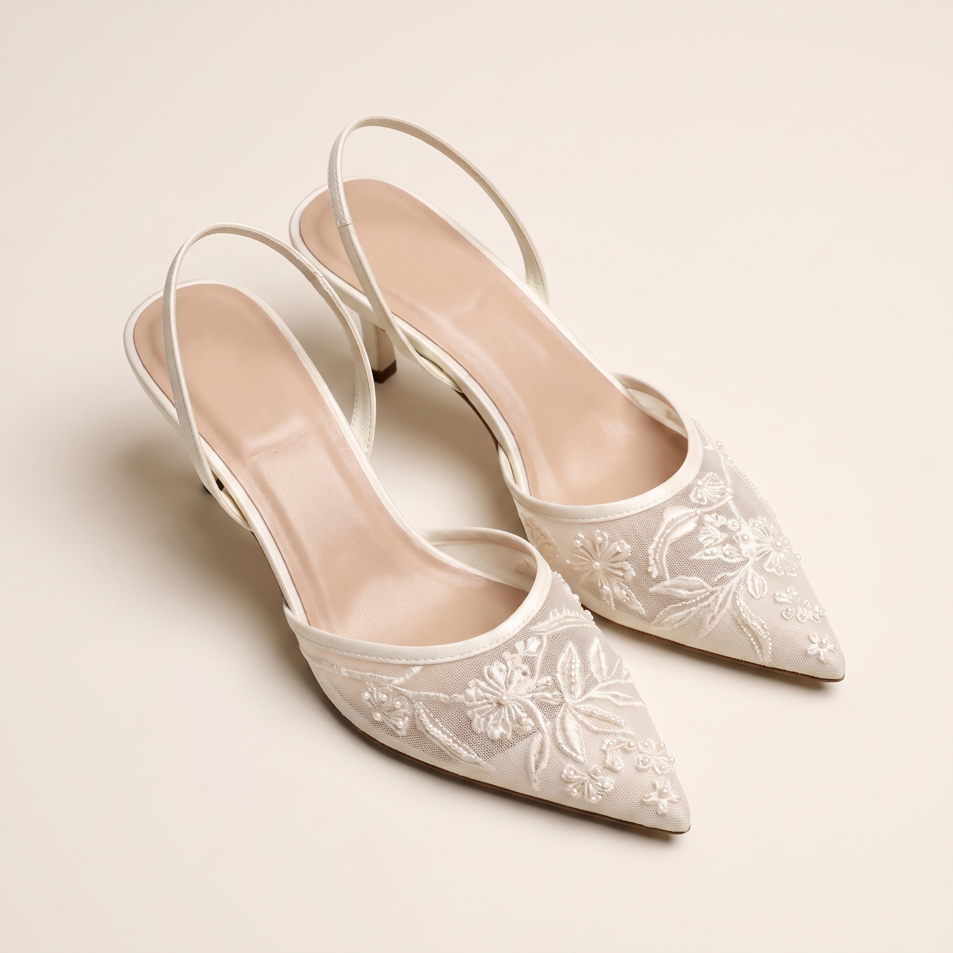 Sunoire womens embroidered mesh mule heels floral pointed toe 08 pair flatlay ivory