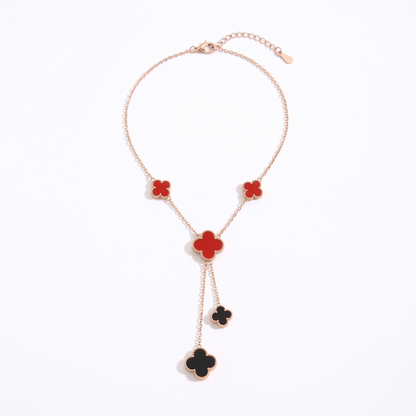 Sunoire premium 316l stainless steel four leaf clover jewelry set trendy women s gift 09 flatlay rose gold black and red clover