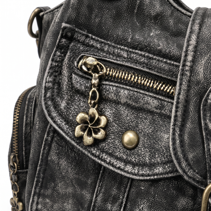 Women's Distressed Denim Shoulder Bag, zip pocket and flower charm close-up