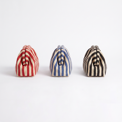 Sunoire brielle red stripe woven clutch bag collection flatlay
