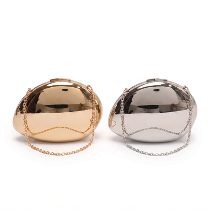Sunoire celeste gold shell clutch bag collection flatlay