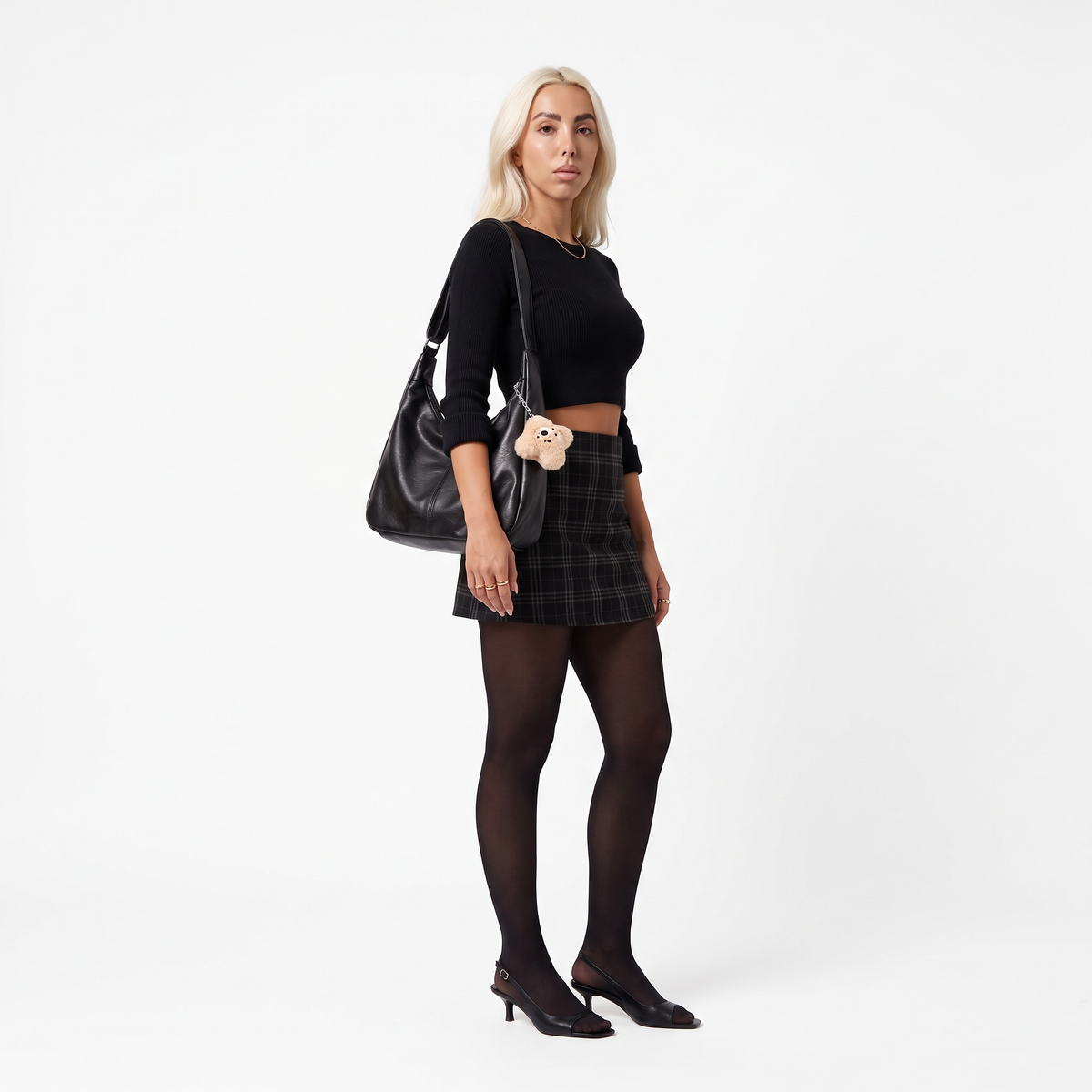 Slouchy Faux Leather Charm Hobo Bag, worn by a model