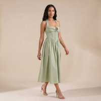 Sunoire emilia sage stretch cotton halter neck midi dress three quarter 01
