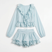Sunoire evarn long sleeve ruffle skirt set mannequin blue 01