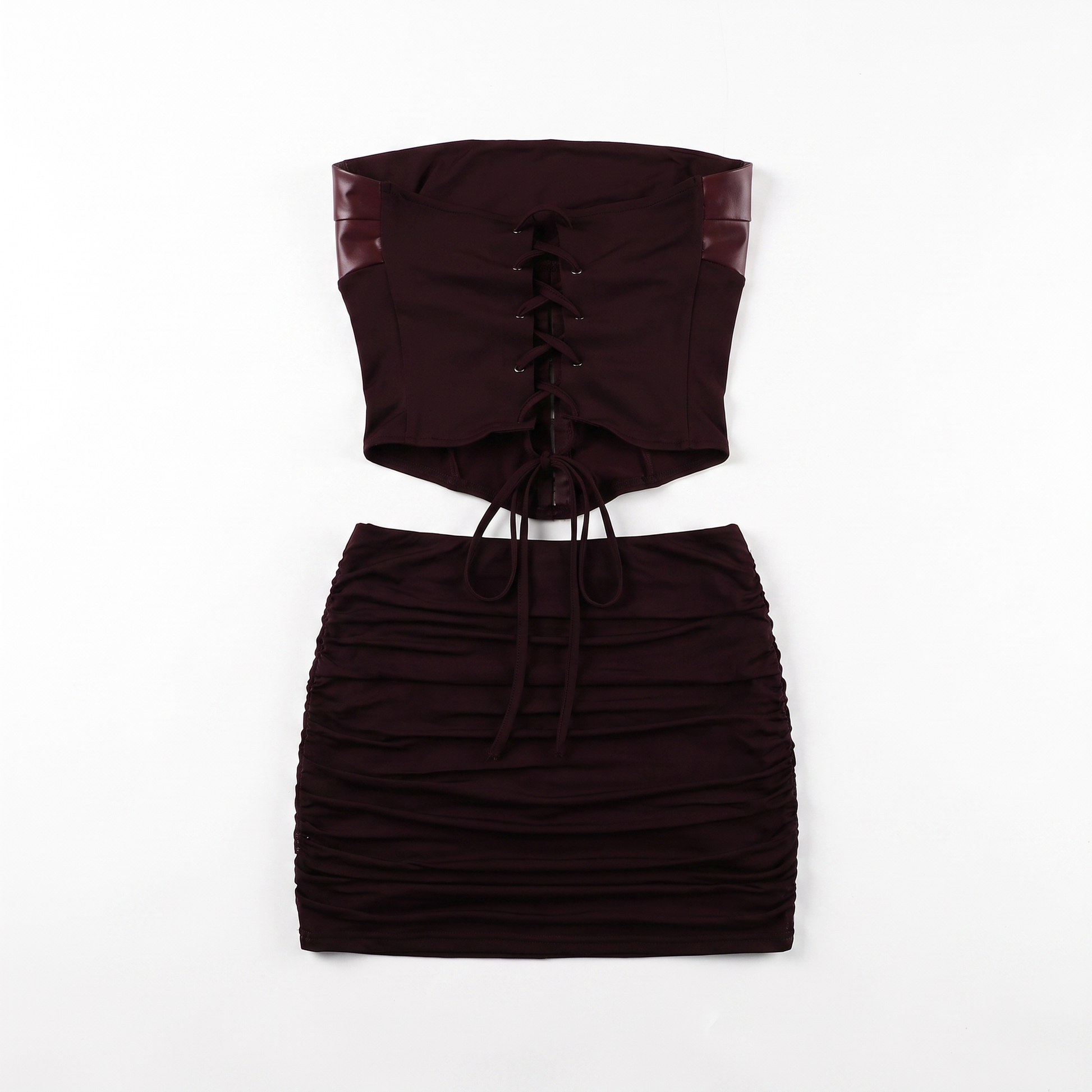 Sunoire fashionable hollow out bodycon strapless backless tube top mini pleated skirt leather pu 2 piece women set garment flatlay 01