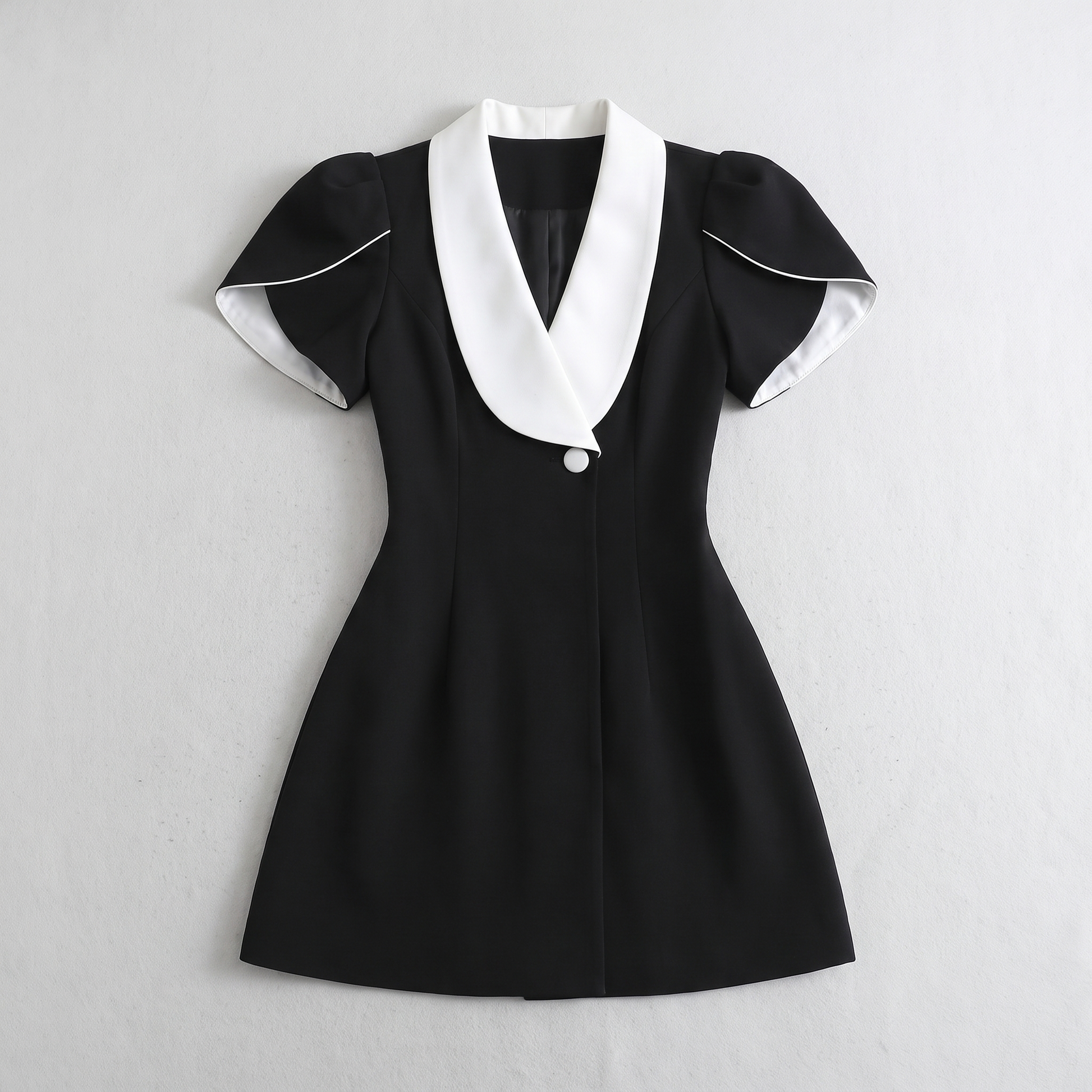 Sunoire guilia black dress garment flatlay 01