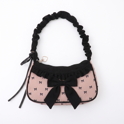 Sunoire junie blush pink bow charm bag 01 front