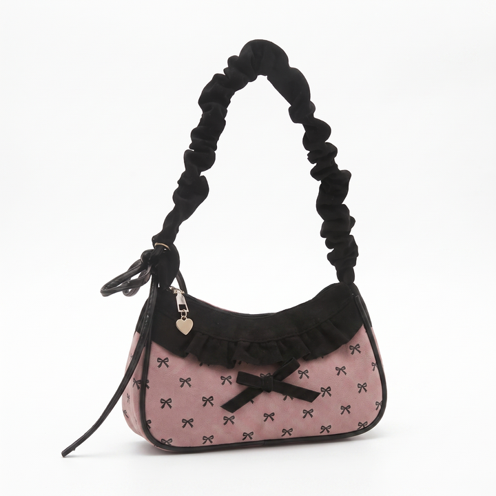 Sunoire junie blush pink bow charm bag 02 three quarter