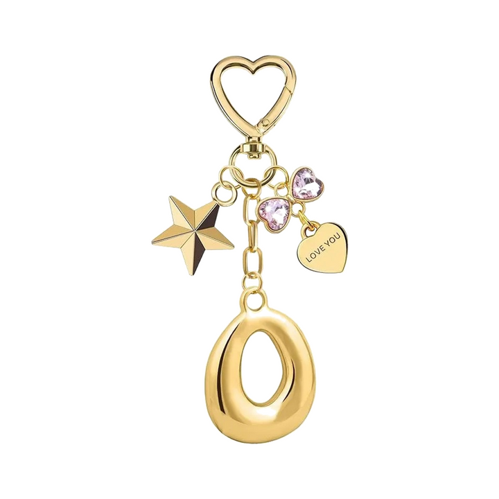 Gold letter O bag charm with heart clasp, star and crystal hearts