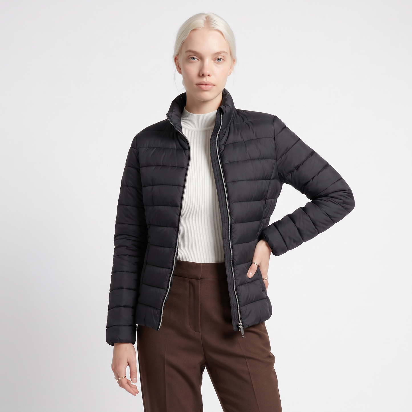 Sunoire lightweight puffer jacket with stand collar and zip closure colorway black front crop 01