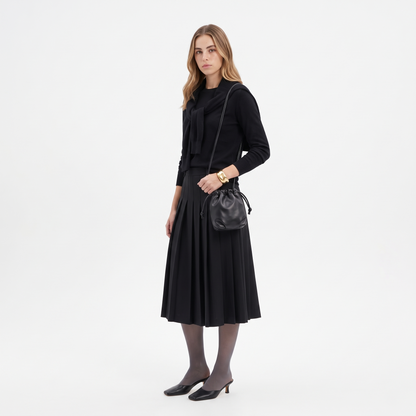 Slouchy Faux Leather Crossbody Bag, worn by a model