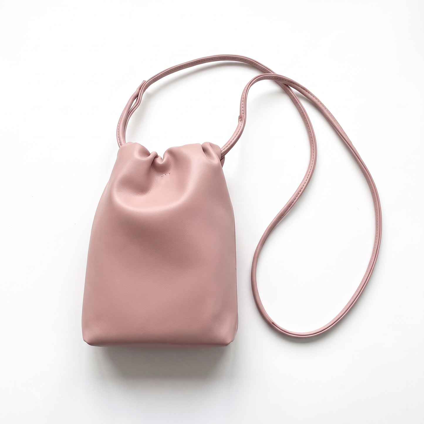 Sunoire mira black drawstring bucket bag colorway pink front hero 01