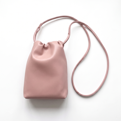 Sunoire mira black drawstring bucket bag colorway pink front hero 01