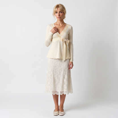 Sunoire polka dot v neck blouse lace up a line top with long sleeves coquette style spring fall layering piece front hero 01