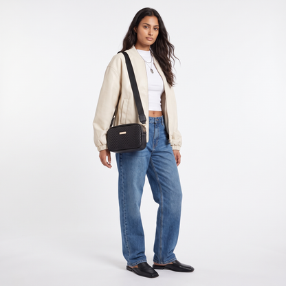 Sunoire harlow black quilted camera bag worn detail 01