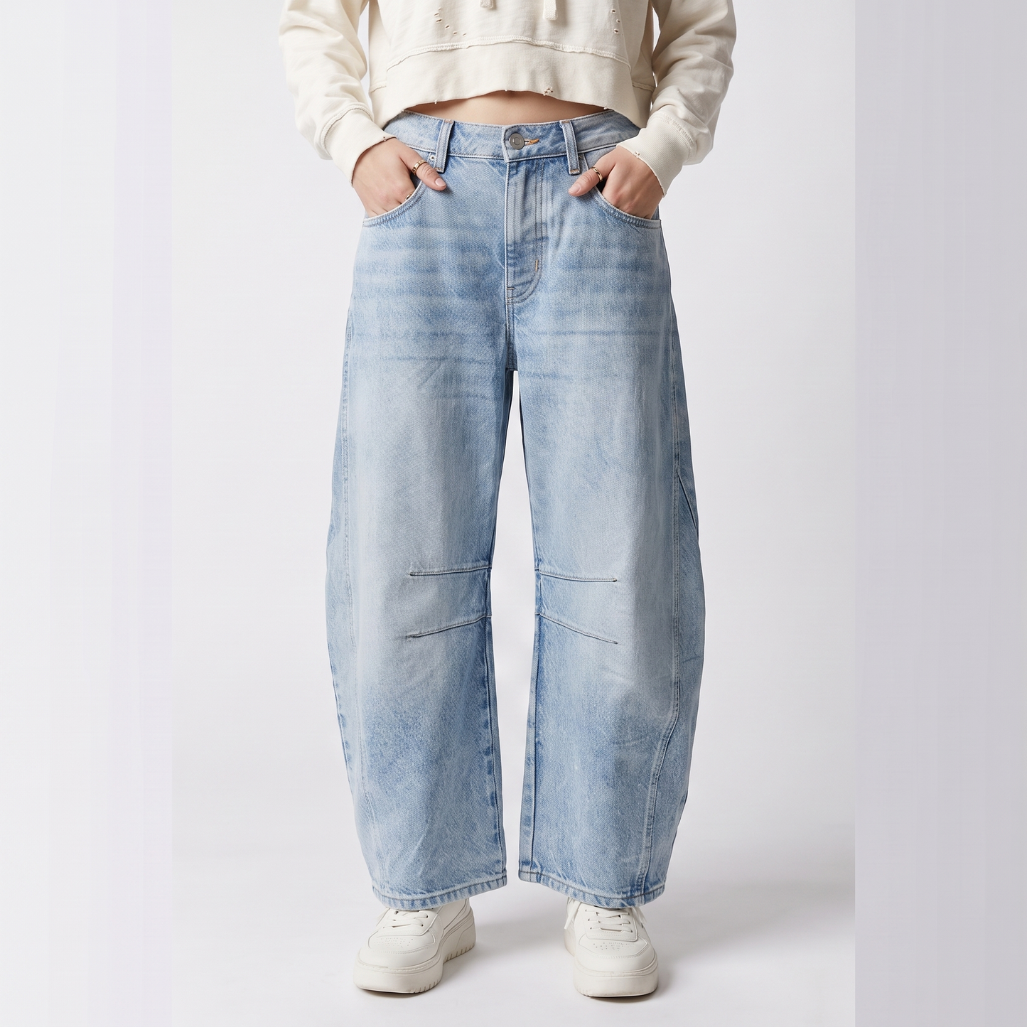 Sunoire relaxed barrel leg jeans with curved silhouette and mid rise bottom front crop 01