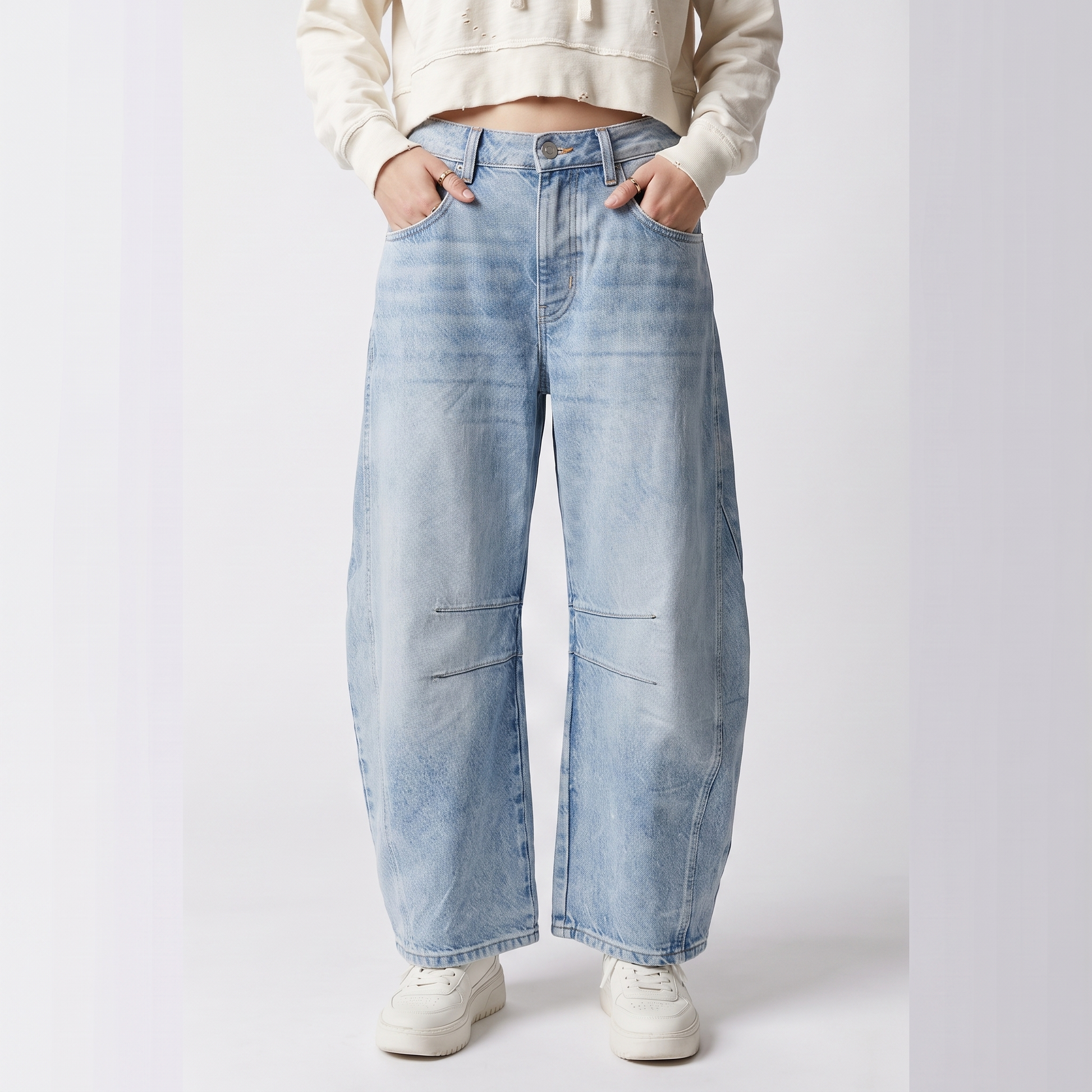 Sunoire relaxed barrel leg jeans with curved silhouette and mid rise bottom front crop 01