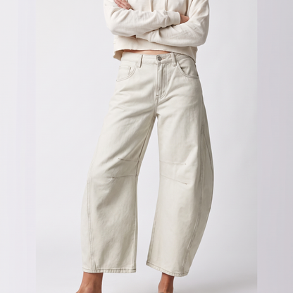 Sunoire relaxed barrel leg jeans with curved silhouette and mid rise colorway white front crop 01