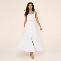 Sunoire Rima white zip-front belted maxi dress walking studio pose