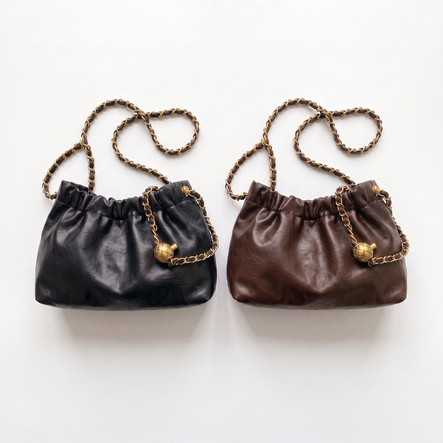 Sunoire sloane black ruched chain shoulder bag collection flatlay