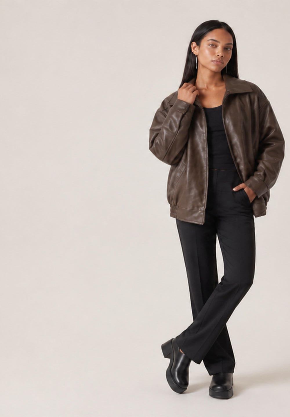 Autumn edit — brown leather bomber, black wide-leg trousers and platform boots